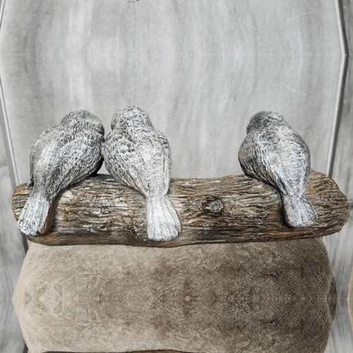 3 birds on a log