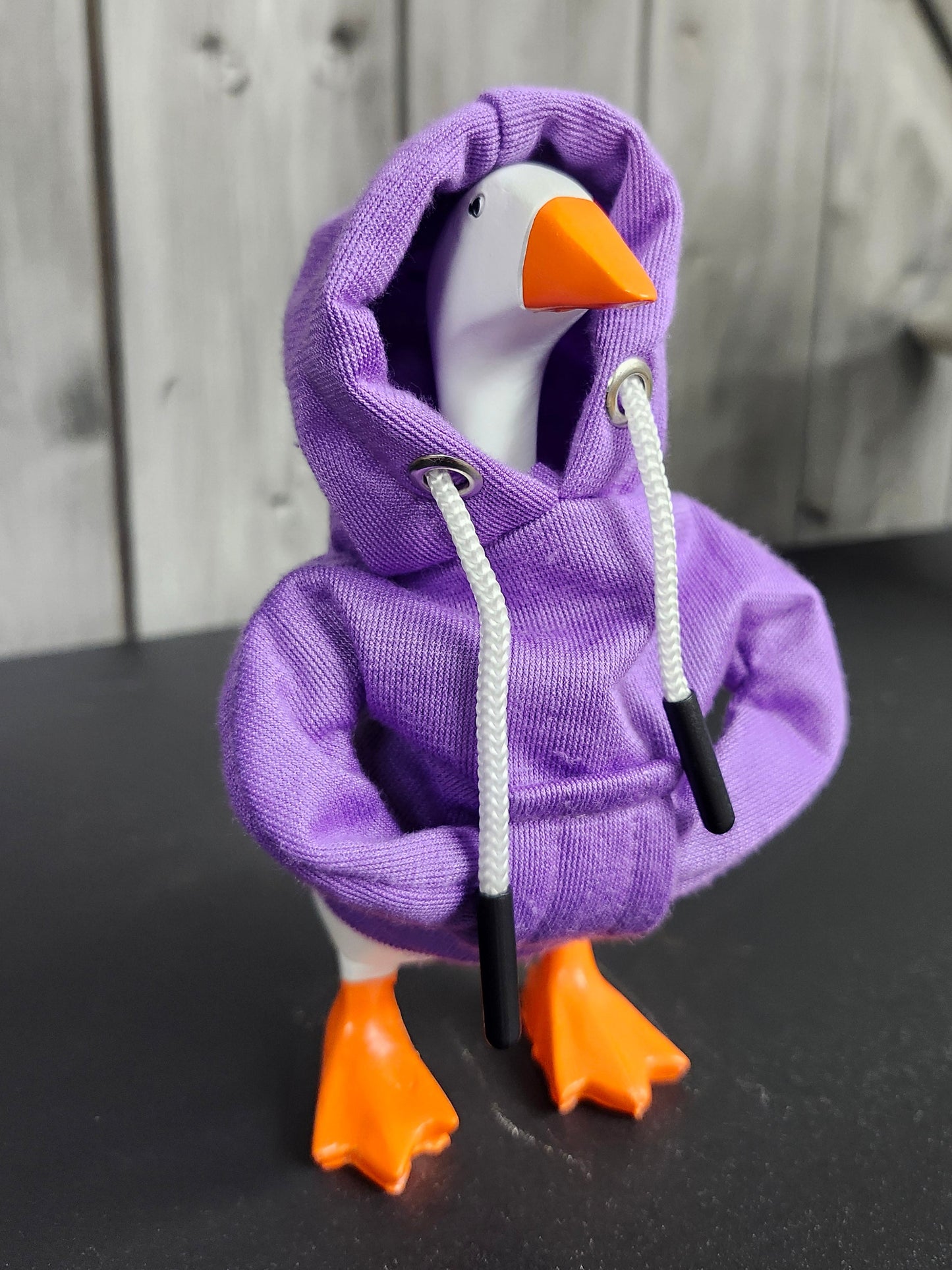 Desk goose with sweatshirt