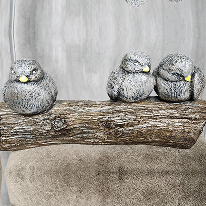 3 birds on a log