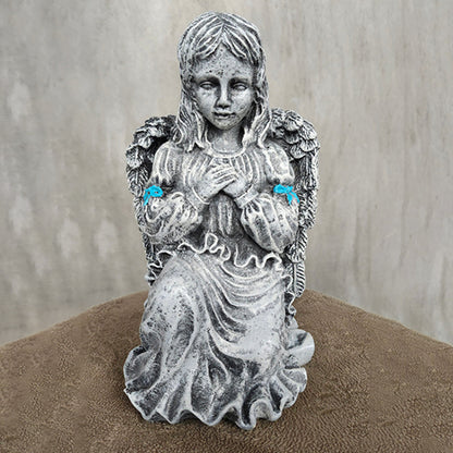 Kneeling small angel