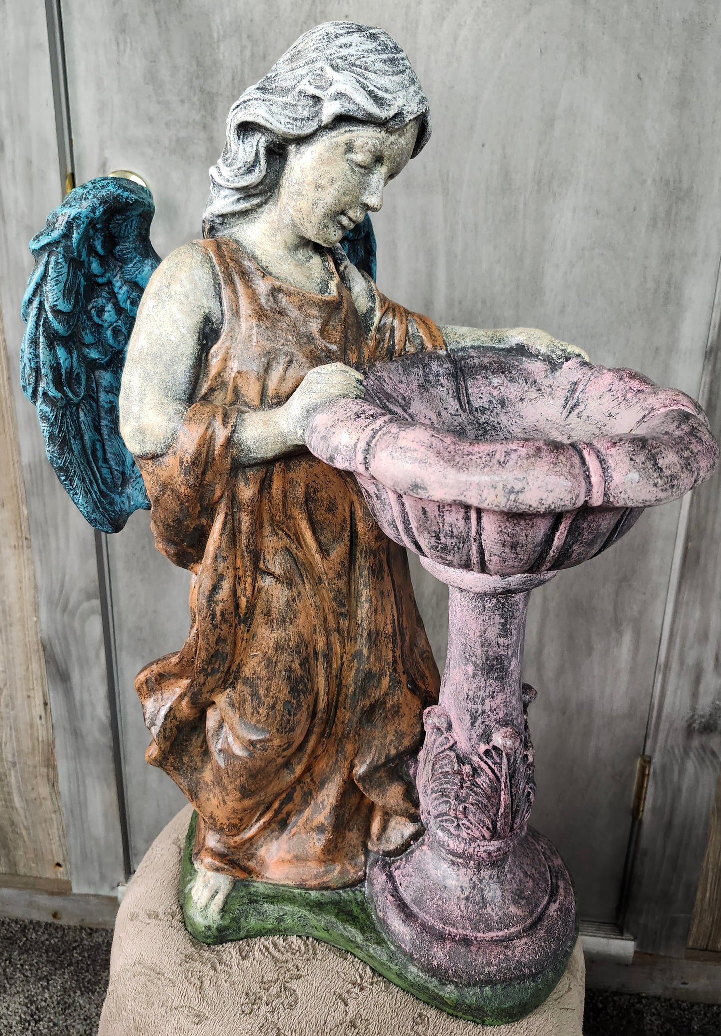 Angel with bowl bird bath