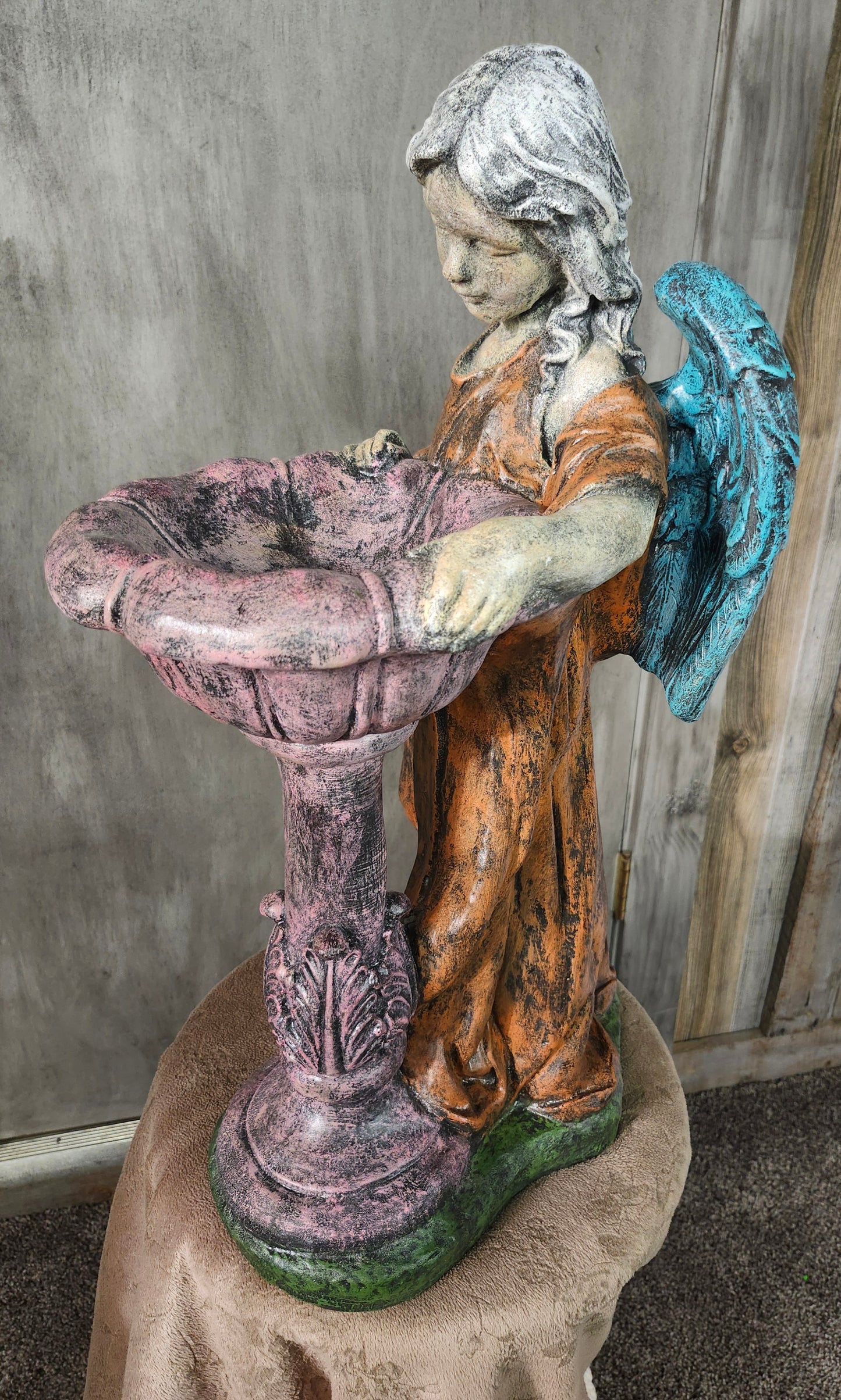 Angel with bowl bird bath