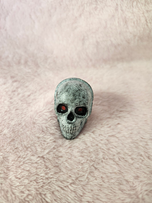 Tiny skeleton head