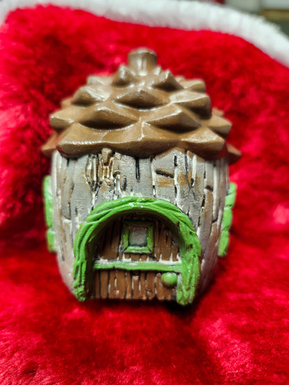 Pinecone fairy house